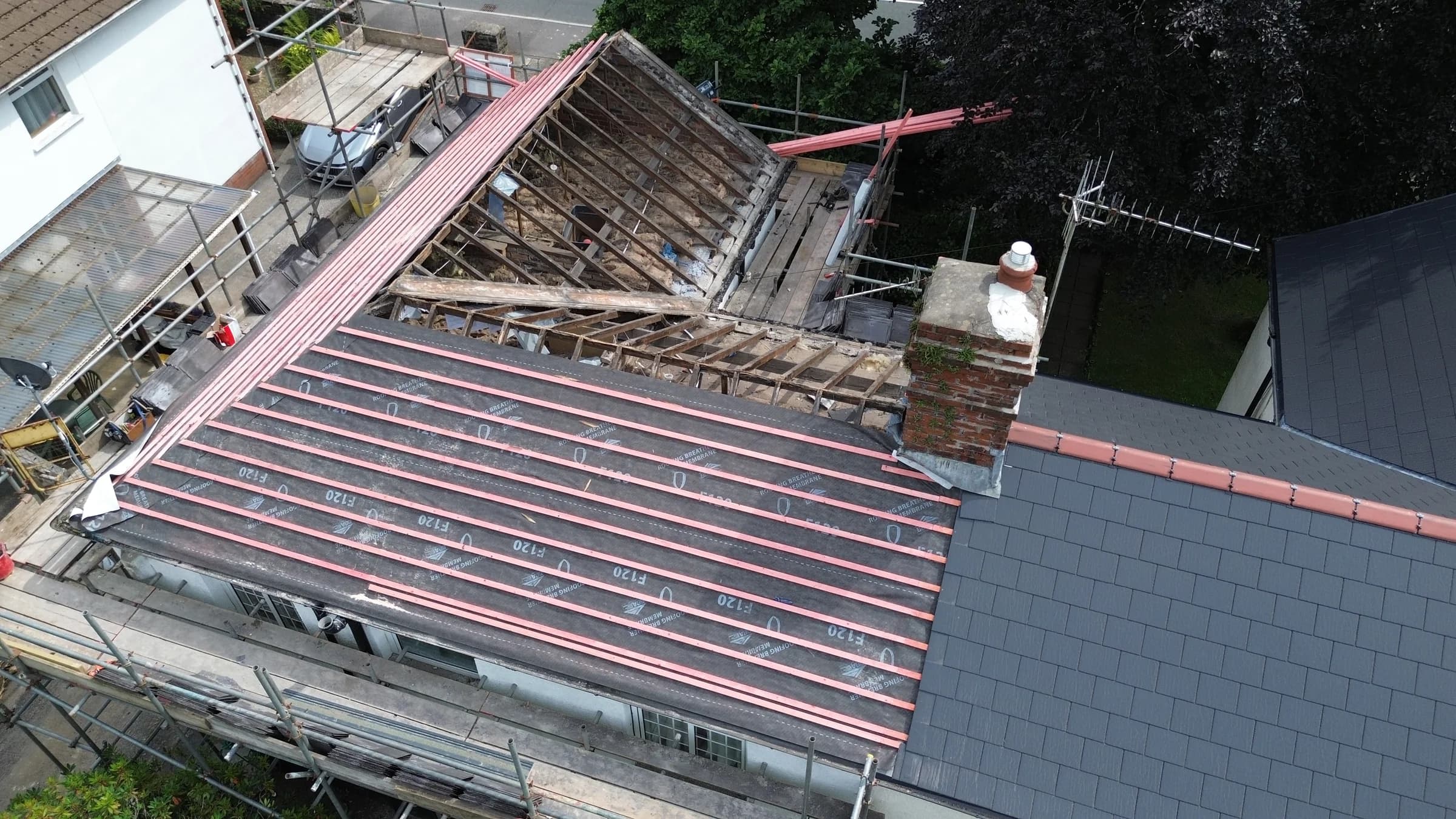 Roof stripped to the rafters with new battens and membrane going on, Neath